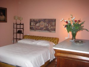 IMG_5257 lovely bedroom, even in pink - and they left us fresh flowers!